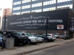 Banner Install in Downtown Dallas Texas by Signs Manufacturing