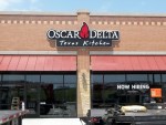 Oscar Delta channel letter sign with channel box and backplate in Forney by Signs Manufacturing of Dallas TX